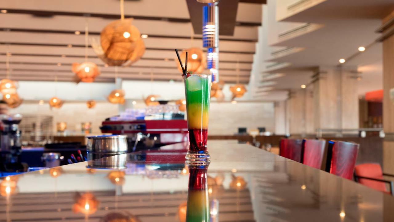 Mds Hotel Calama Esterno foto A layered cocktail