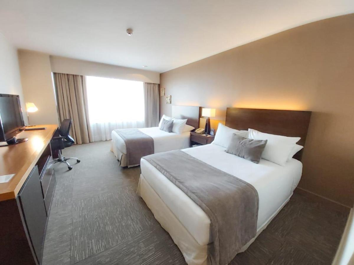 Mds Hotel Calama Esterno foto A typical hotel room